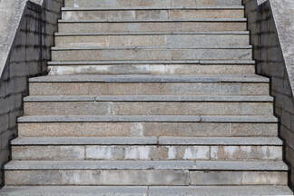 An image of an outdoor concrete staircase.